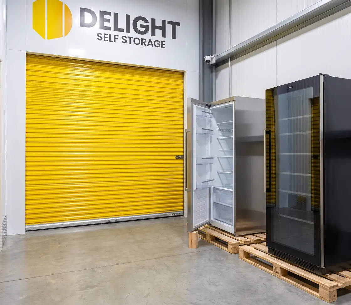 Home appliances wrapped and stacked on pallets at the Delight Self Storage facility in the UAE